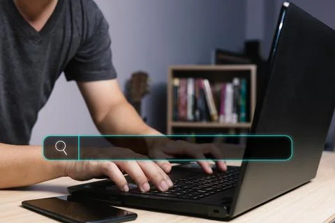 Searching Browsing Internet Data Information with blank search bar.handof b.. Stock Photos