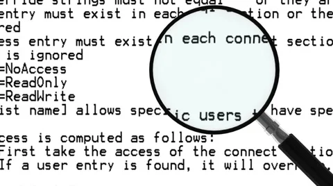 Searching computer code with a magnifying glass HD video 1080 Stock Footage 47630128