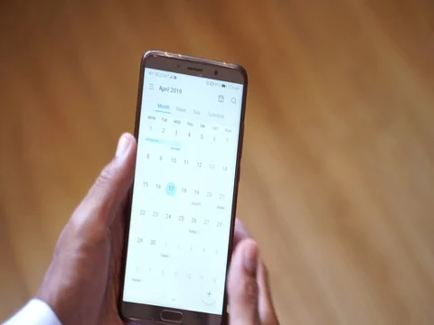 Searching a date in  mobile Stock-Footage 105023654