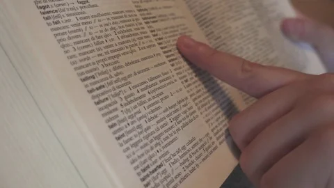 Searching dictionary Stock Footage 77695911
