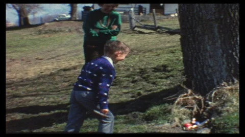 Searching easter eggs (vintage 8 mm amateur film) Stock Footage 584505