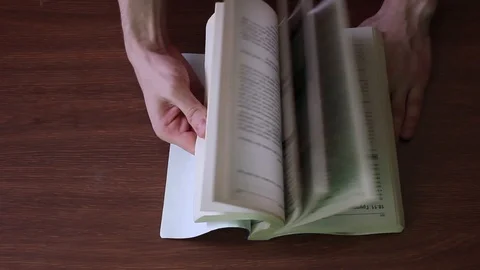 Searching information in book Stock Footage