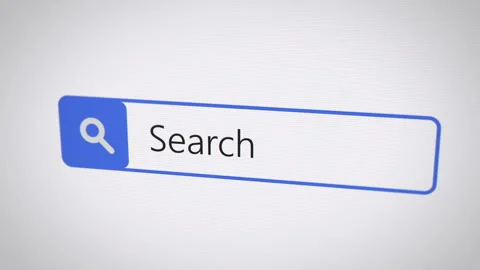 Searching internet in browser window on computer monitor - search bar Stock Footage 254493876