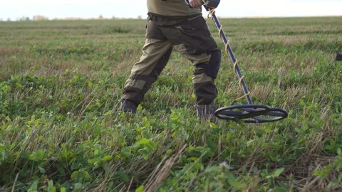 Searching with Metal Detector close up Stock Footage 118612357