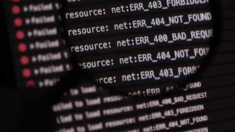 Searching for network errors in browser console logs using magnifying glass.. Stock Footage 304804523