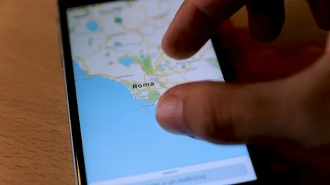 Searching Rome on smartphone map Stock Footage 98358485