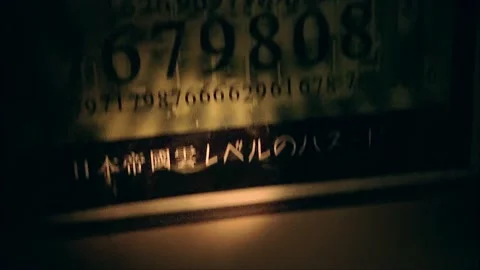 Searching the room revealed a code wall and Japanese military uniforms Stock Footage 316814538