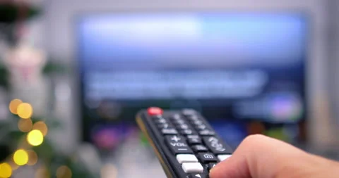 Searching on smart tv with remote control on Christmas Stock Footage 137915845