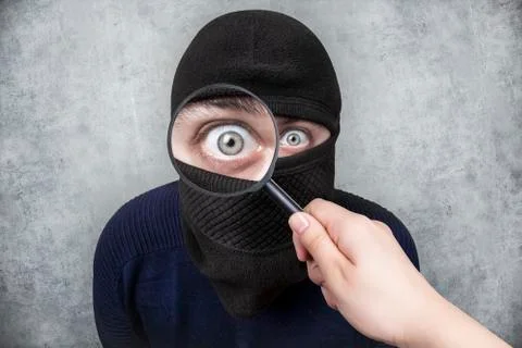 Searching thief Stock Photos