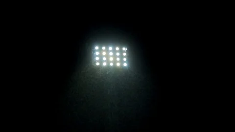 Searchlight in the stadium in the rain Stock Footage 82981742