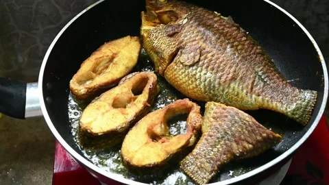 Seared Fish Cooked On Pan Frying. Fresh Fish Fried On Hot Oil Pan Stock Footage 202055221