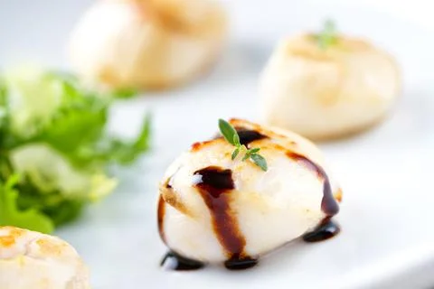 Seared Scallops with Balsamic Sauce and Side Salad Stock Photos