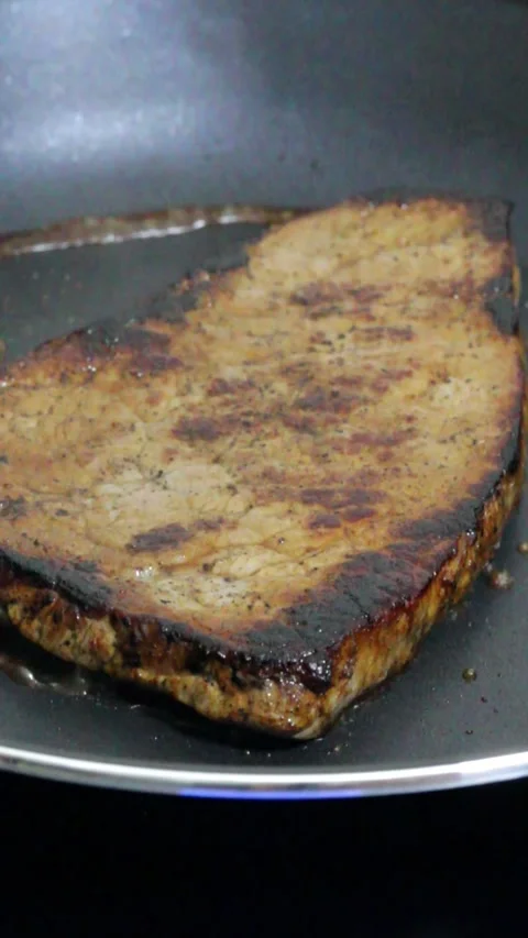 Searing a delicious steak Stock Footage 282057009