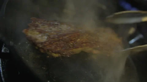 Searing Steak In Pan w/ flames Stock Footage 42428670