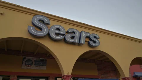 Sears store logo on old building after hours Stock Footage 155030065