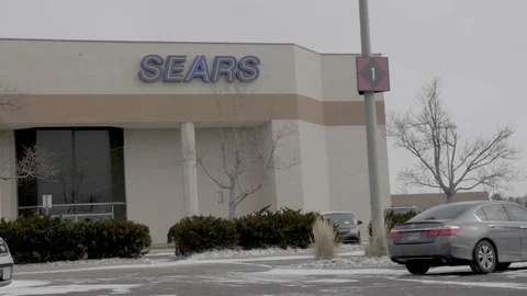 Sears Storefront with Parking Lot Snowing in Colorado Springs, Colorado Video stock 100521092