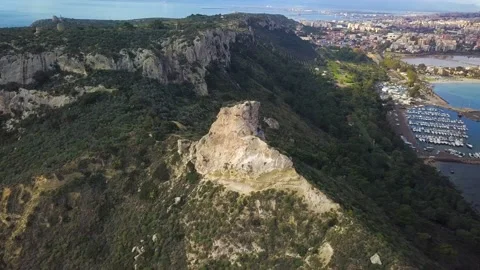 Seascape Aerial Shot saddle of the devil (sella del diavolo) with calm sea in Stock-Footage 146311310
