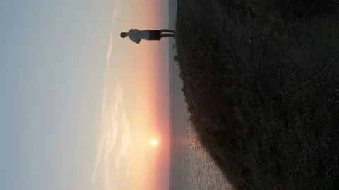 Seascape and cliff at sunset. Vidéo 198847816