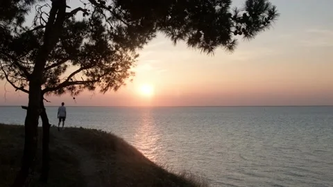 Seascape and cliff at sunset. Stock Footage 198848497