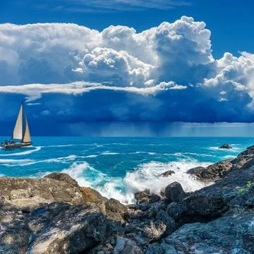 Seascape and Cliffs with Storm Clouds and Torrential Rain - Liguria Italy Stock Photos