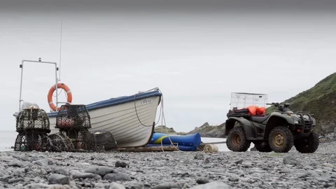 Seascape backdrop with rowing boat in the foreground stock footage Video stock 116755074