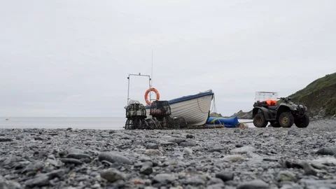 Seascape backdrop with rowing boat in the foreground stock footage Video stock 116762538