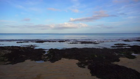 Seascape from Beach over the Rocks part 1 Stock Footage 139016992