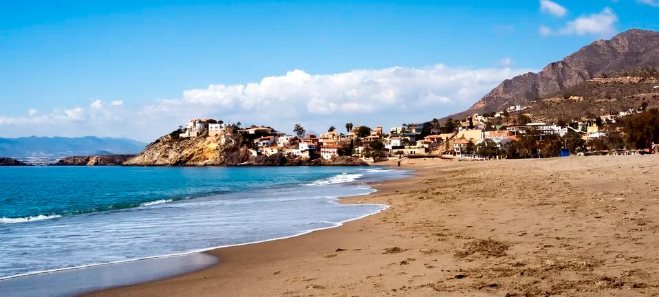 Seascape with beach, sea and mountains  in Murcia,Spain Stock Photos