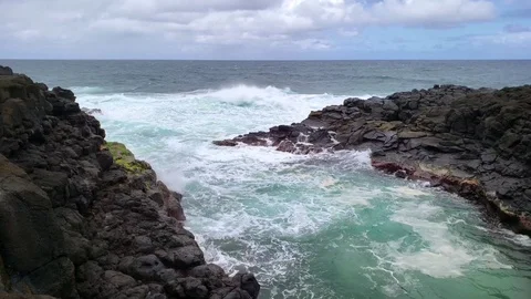 Seascape Breaking Waves on Black Lava Rock Stock Footage 105886092