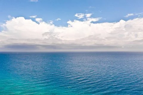 Seascape with clouds by day, view from above. Stock Photos