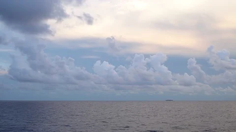 Seascape with a cloudy sky and merchant vessel. Time laps. Stock Footage 101308283