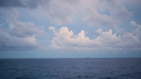 Seascape with a cloudy sky and merchant ship. Time laps. Stock Footage 101308312