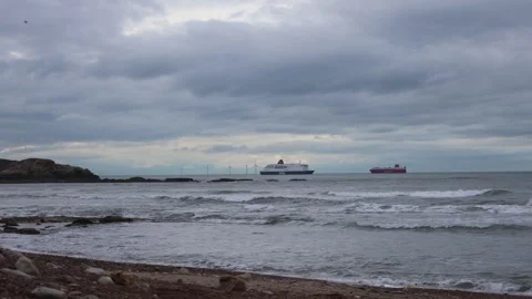 Seascape in Cloudy Weather With Two Ships Sailing in the Distance Stock Footage 246940209