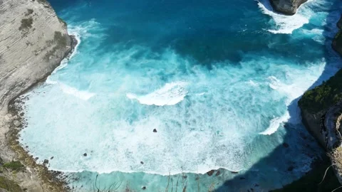 Seascape dark ocean background wave splash on rock. Tropical sea Stock Footage 317429253