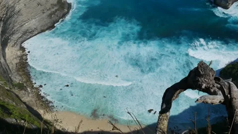 Seascape dark ocean background wave splash on rock. Tropical sea Stock Footage 317429257
