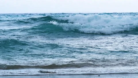Seascape dark ocean background wave splash on rock. Tropical sea Stock Footage 317429258