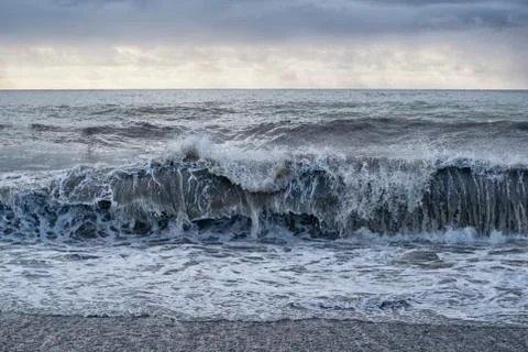 Seascape during a storm with a wave Stock Photos