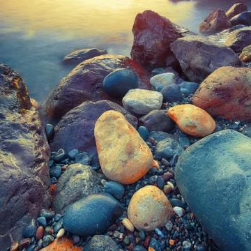 Seascape during sunset Stock Photos