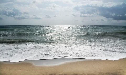Seascape of an empty beach. Stock Photos