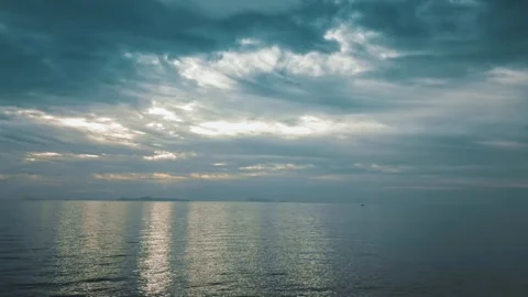 Seascape with Heavy Clouds and Sun Over Calm Sea, Light Reflecting on Water Stock-Footage 279933204