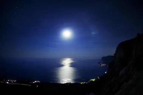 Seascape at night. Stock Photos
