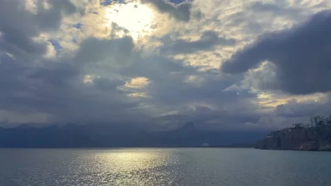 Seascape. Rays of light breaking through the clouds Stock Footage 238033675