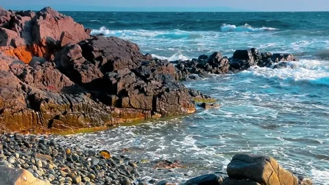 Seascape with rocks and cliffs Stock Footage 130550007