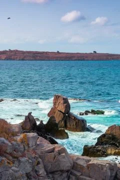 Seascape with rocks and cliffs Stock Photos