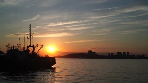 Seascape with a ship on the background of the sunset. Stock Footage 137838670