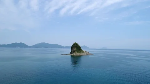 The seascape with the small island Stock Footage 93497481