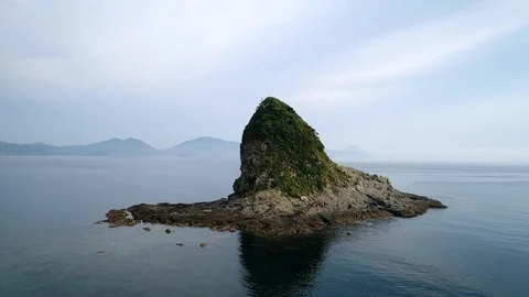 The seascape with the small island Stock Footage 93497497