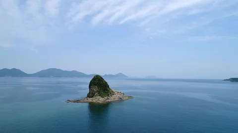The seascape with the small island Stock Footage 93497507