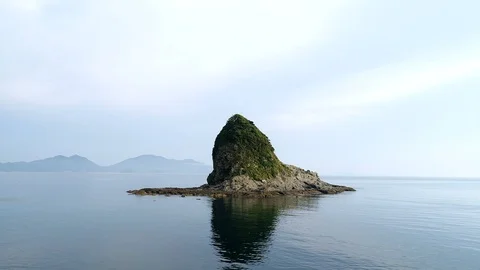 The seascape with the small island Stock Footage 94846084