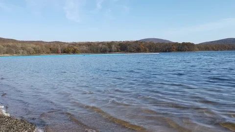 Seascape with small waves lapping on the shore 库存影片 118096318